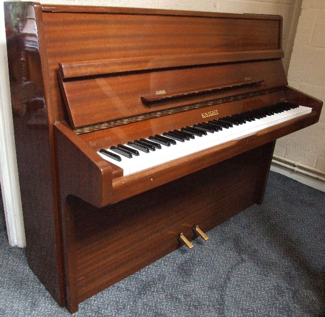 Upright piano cabinet and keyboard